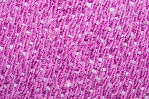 istock Pink fabric texture. knitted textile background. woven material macro 1219281506