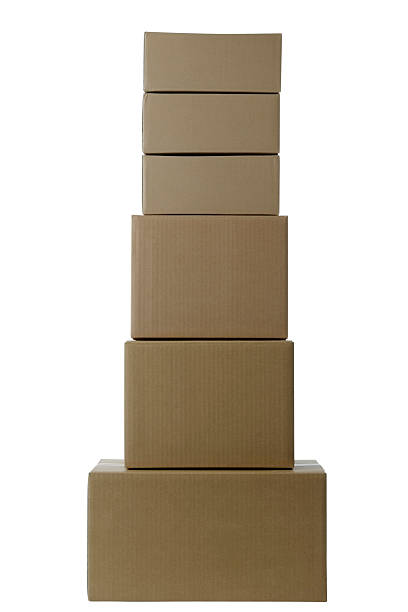 istock Isolated shot of stacked blank cardboard box on white background 121928524