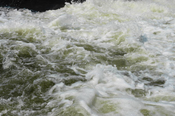 istock The currents flow violently, cracking rocks and splashes of mist. 1219285941