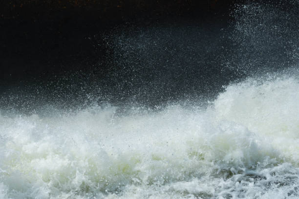 istock The currents flow violently, cracking rocks and splashes of mist. 1219285955
