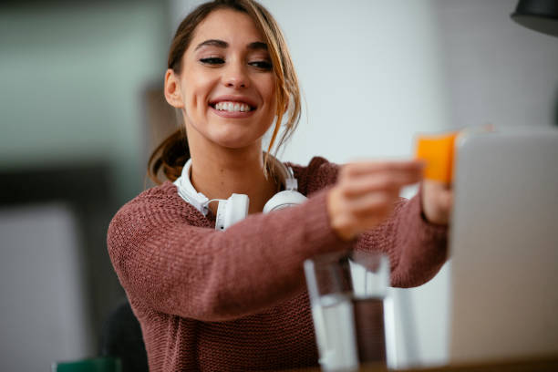 istock Beautiful woman working in office. 1219290282