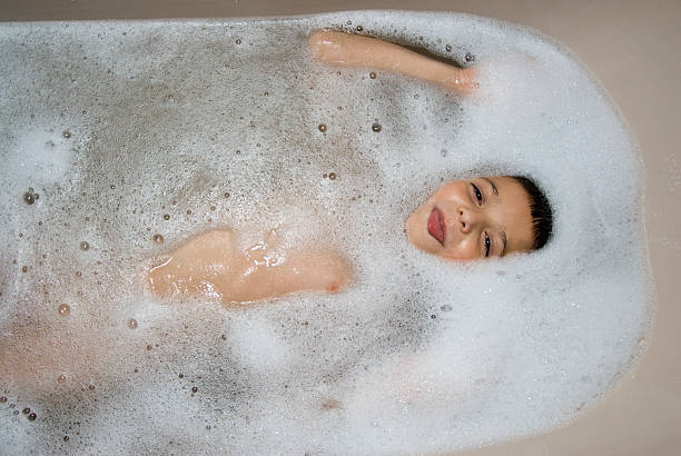 istock Child shows tongue with bath foam 121929244