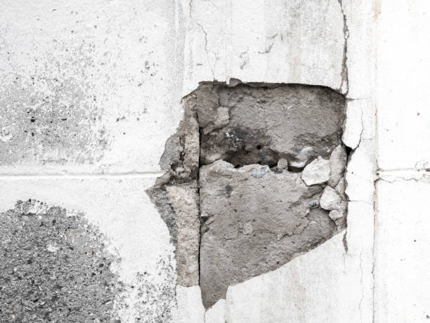 istock Close-up. The old brick block is corroded. 1219295484