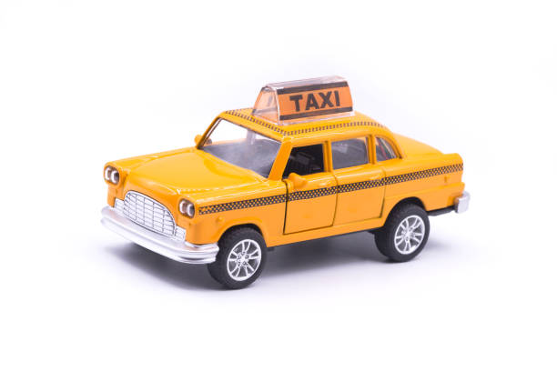 istock Yellow taxi cab car model isolated on white background 1219299023