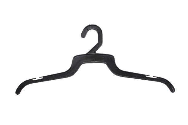 istock Black plastic clothes hanger isolated on white background.Clothes hanger 1219299411