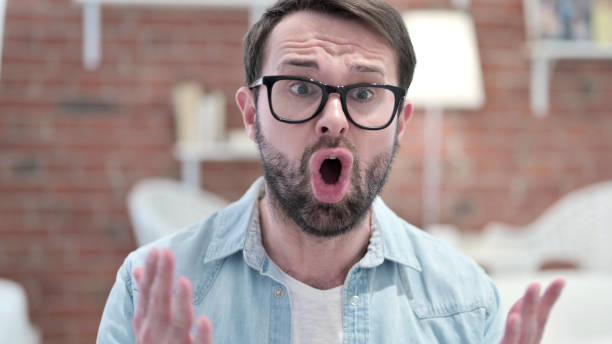 istock Portrait of Beard Young Man Shouting in Anger 1219301445