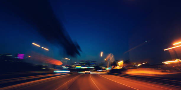 istock Driving on highway Florida at night 1219301687