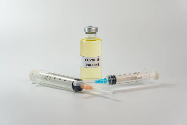 istock Covid-19 vaccine concept on the white background 1219303717