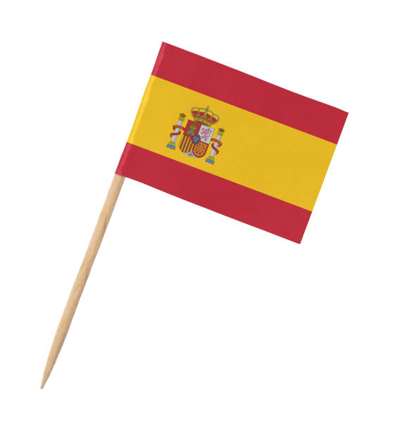 istock Small paper Spanish flag on wooden stick, isolated on white 1219306382