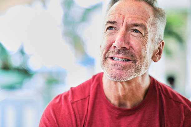 istock Healthy fit body middle aged man looking away 1219306559