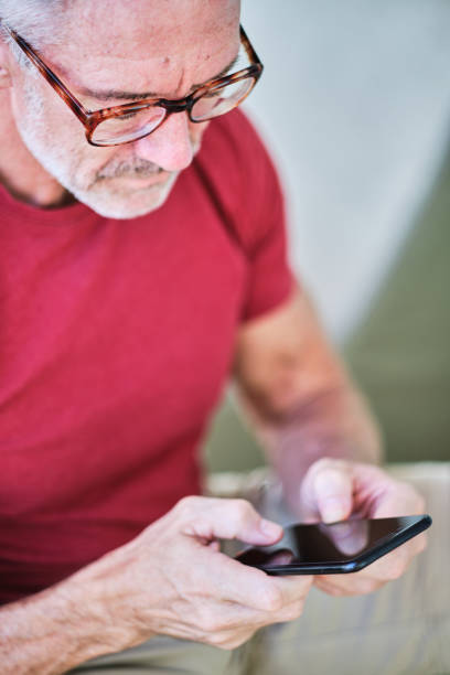 istock Healthy fit body middle aged man using mobile phone 1219306591
