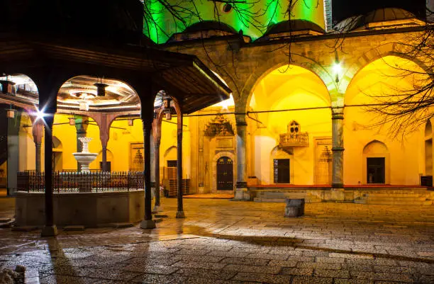 Night view of the Shadirvan Fountain on courtyard of Gazi Husrev-bey Mosque in Sarajevo