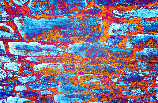 Colorful stone wall as an abstract background.