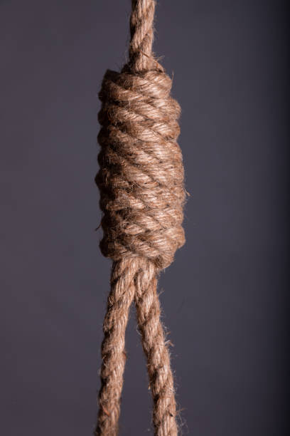 istock Close-up of a hang noose rope on a grey background in studio 1219307862