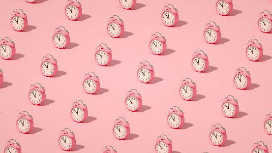 3d rendering of Pink Alarm Clock on Pink Background. Countdown, reminder, deadline concept. Isometric View