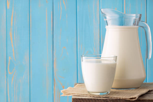 istock milk in glass and jug 1219310919