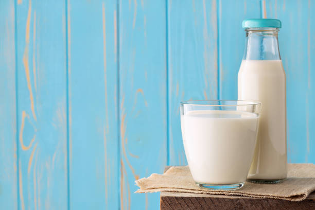 istock milk in glass and bottle 1219310936