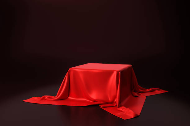 istock Red luxurious fabric placed on top pedestal or blank podium shelf on black background with luxury concept. 3D rendering. 1219315487