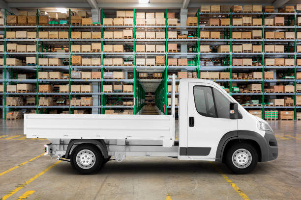 istock Pickup truck loaded with parcels in large warehouse 1219317599