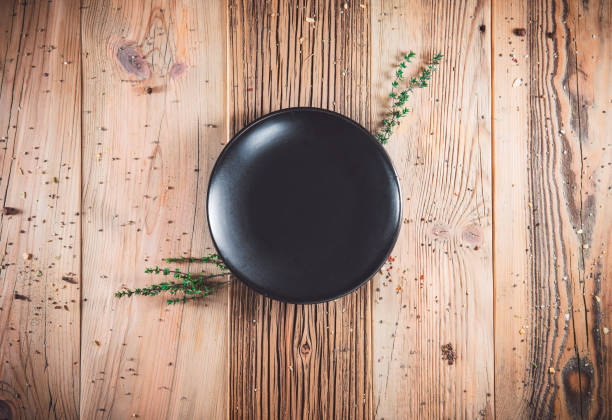 istock Blank clean plate with on table. Ready to serve fresh meal 1219324933