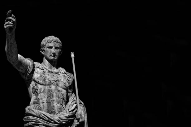 Augustus, first emperor of Ancient Rome (Black and White with copy space) Caesar Augustus, first emperor of Ancient Rome and father of the nation. Old bronze statue along the Imperial Forum Road emperor stock pictures, royalty-free photos & images