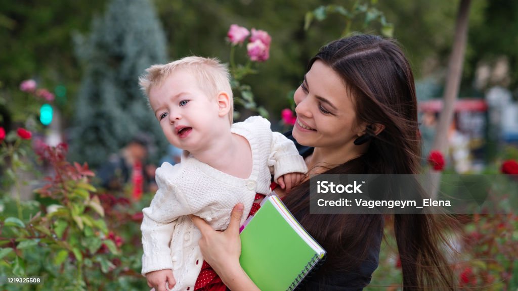 Working mom on maternity leave Working mom on maternity leave. Mompreneur. Mom in beautiful style. Female happiness. Busy working day. Modern business lifestyle. Freelance. Family leisure Adult Stock Photo