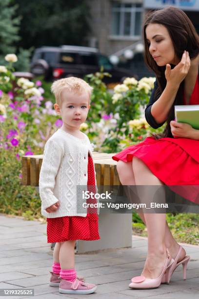 Working Mom On Maternity Leave Stock Photo - Download Image Now - Busy, Outdoors, Parent