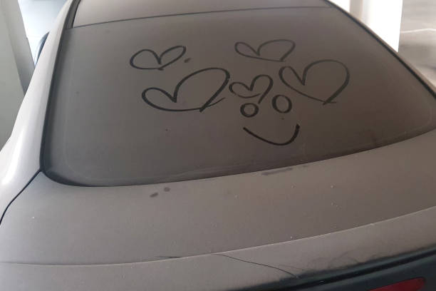 istock write heart  painting on very dirty car 1219326209