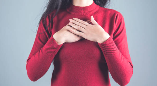 istock woman hand on heart 1219326670
