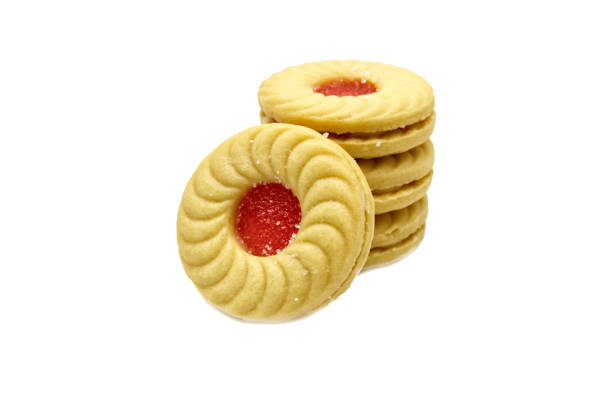 istock Lychee flavoured jam sanwiched between two cream cookies, Isolated on white background. Tasty treats that are just as fun to eat as they are delicious. They are a great on-the-go allergy free snack. 1219329051