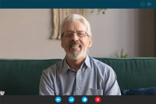 istock Headshot of senior man talk online using webcam 1219329144