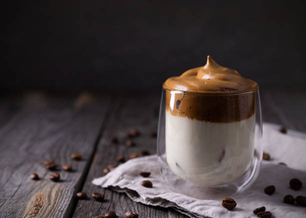 istock Keto dalgona whipped coffee with milk in a glass 1219329344