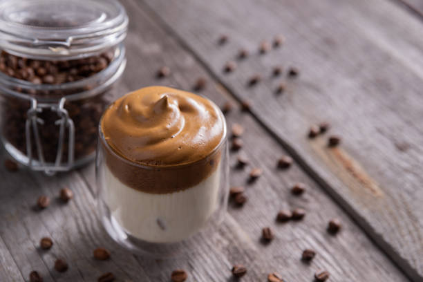 istock Keto dalgona whipped coffee with milk in a glass 1219329350