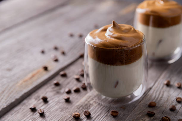 istock Keto dalgona whipped coffee with milk in a glass 1219329355