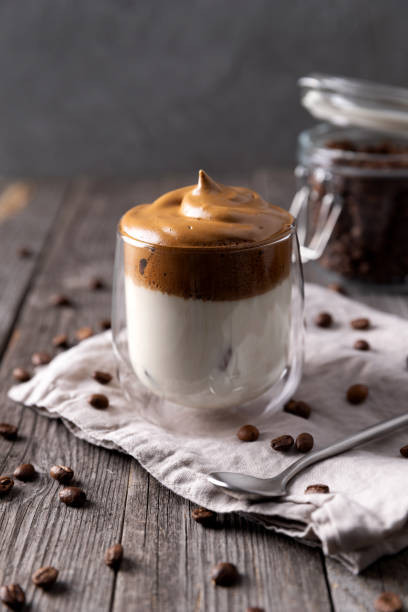 istock Keto dalgona whipped coffee with milk in a glass 1219329370