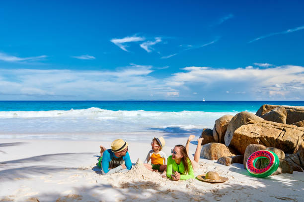 istock Family with three year old boy on beach 1219332986