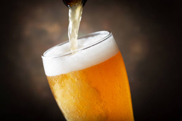 istock beer pouring into glass 1219333144