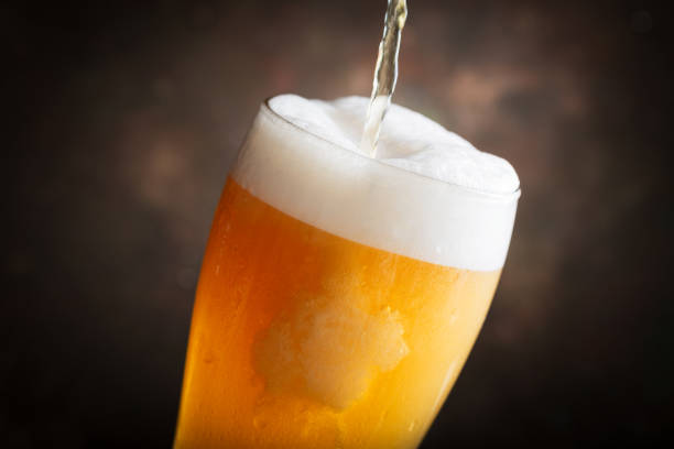 istock beer pouring into glass 1219333146