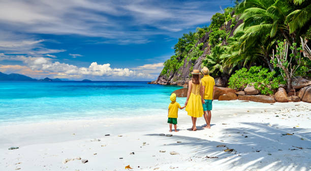 istock Family with three year old boy on beach. Seychelles, Mahe. 1219336846
