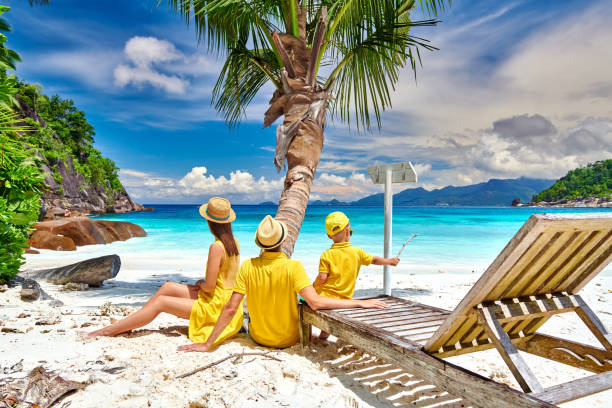 istock Family with three year old boy on beach. Seychelles, Mahe. 1219336853