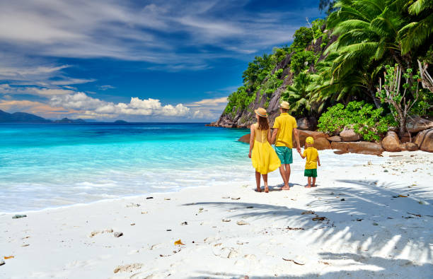 istock Family with three year old boy on beach. Seychelles, Mahe. 1219336860
