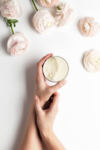 cosmetic body or face cream container with care cruelty-free product. - moisturizer cosmetics merchandise human hand imagens e fotografias de stock