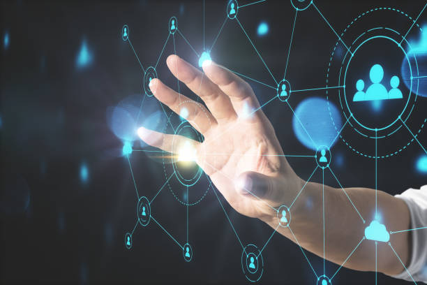 istock Hand pushing social network hologram 1219346357