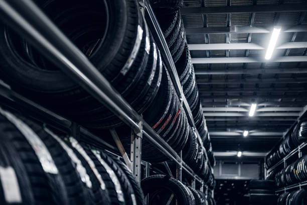 istock Variety of tyres at busy warehouse 1219346789