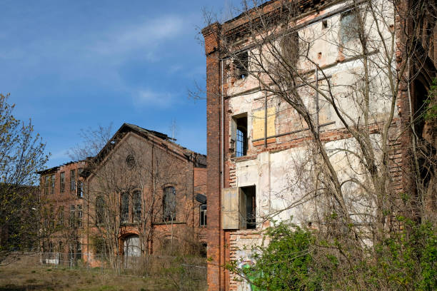 istock old abandoned factory or industrial building 1219347515
