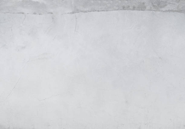 istock texture of white wall, Concrete wall texture,cement gray white background. vintage white background of natural cement or stone old texture material 1219347673