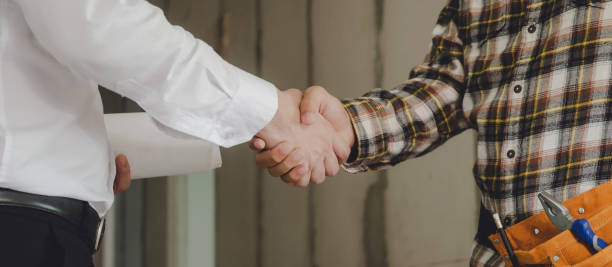 istock Panoramic banner. construction worker team contractor handshake with engineer after finish up business meeting to start up project contract in construction site building, teamwork, partnership concept 1219347805