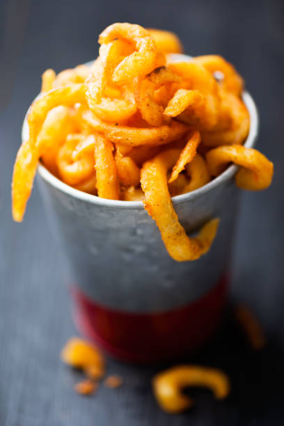 istock rustic golden crispy curly fries 1219348845