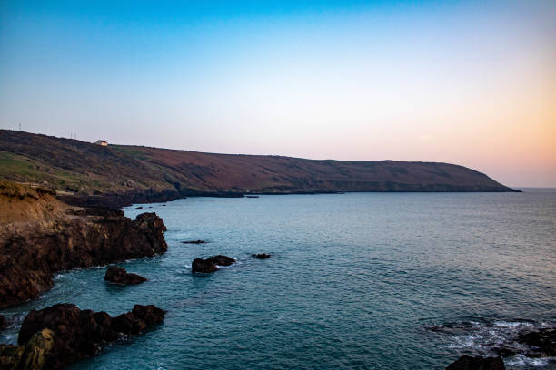 Rugged cliffs and sunset  off the Clonakilty, West Cork coastline.