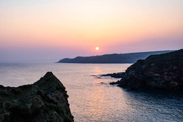 Rugged cliffs and sunset  off the Clonakilty, West Cork coastline.